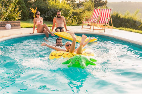 Preview: Couple having fun in the swimming pool