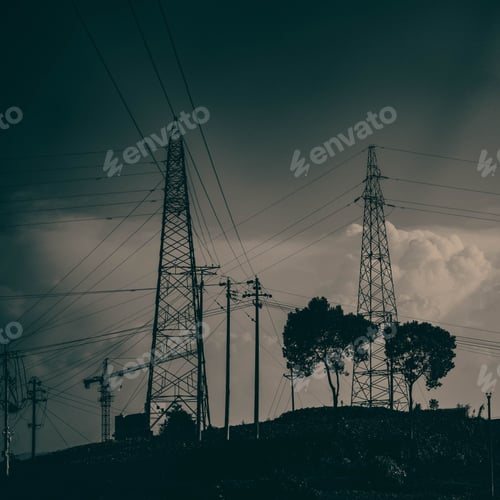 Aperçu: Scenic view of transmission towers against a cloudy sky