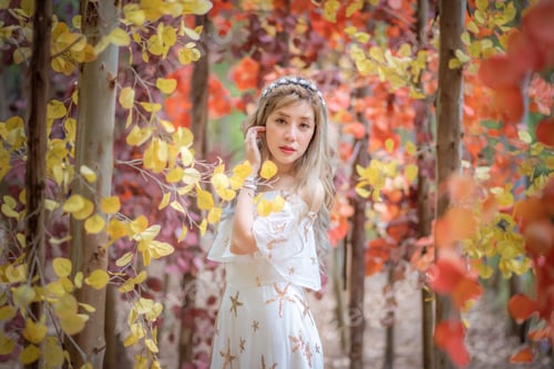 Preview: Portrait beautiful woman tourist posing happiness with smile ,she wearing a nice dress to travel in