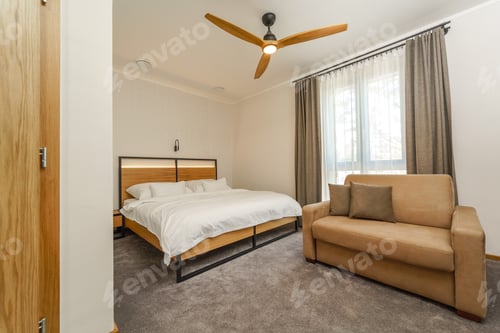 Interior of modern bedroom suite in luxury hotel