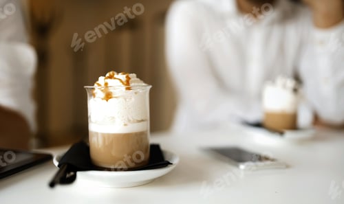 Preview: Coffee decorated with caramel syrup