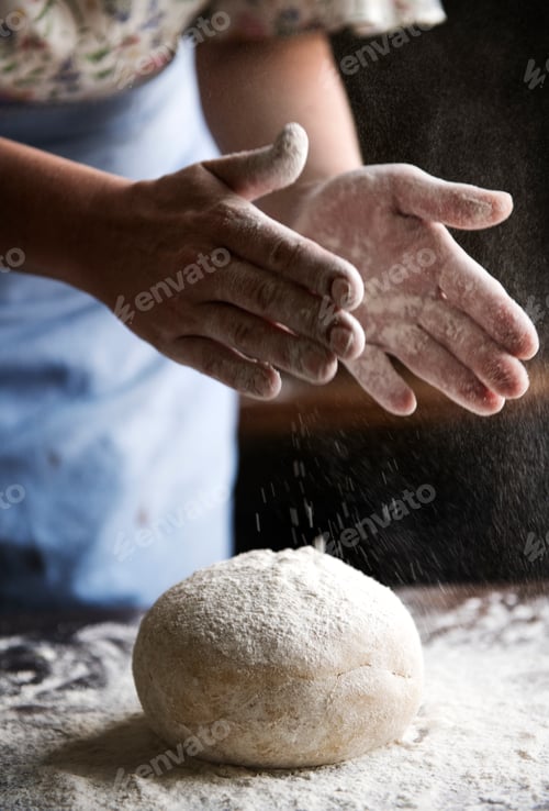 Preview: A housewife making a dough