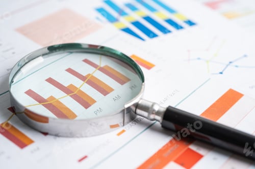 Preview: Magnifying glass on charts graphs paper. Financial development, Banking Account, Statistics,