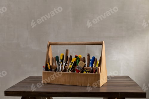 Preview: Construction tools and toolbox on wooden table background. Tools kit and tool box