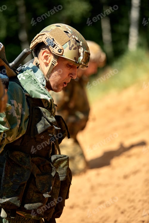 Preview: Full military experience - One day commando - running through the water with automatic rifle replica