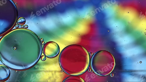 Preview: Abstract Colorful Food Oil Drops Bubbles and spheres Flowing on Water Surface