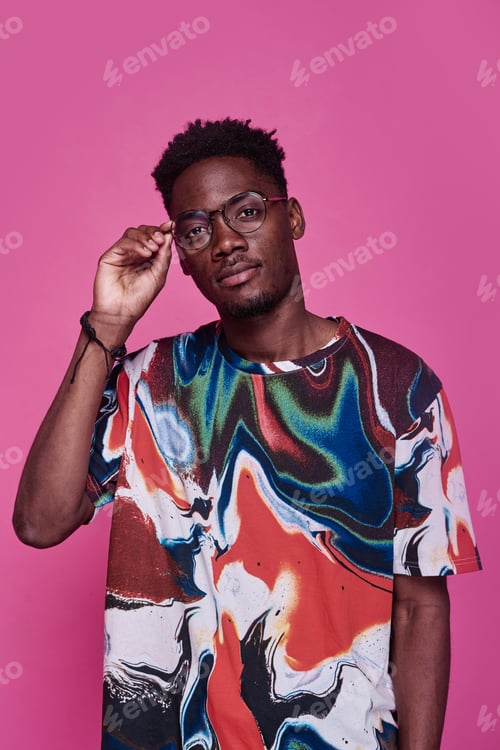 Preview: African stylish teenage boy in eyeglasses