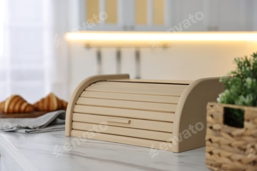 Preview: Wooden bread box on white marble table in kitchen
