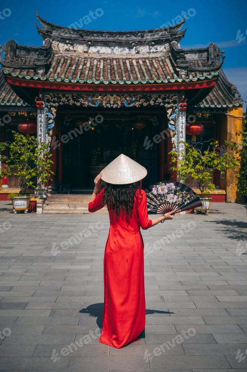 Preview: A woman in a traditional Vietnamese dress on the background Fukien Chinese Congregation Assembly