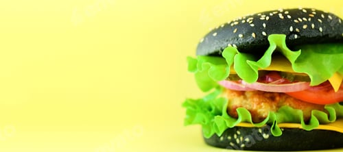 Preview: Fast food concept. Square crop. Juicy homemade hamburgers on yellow background. Take away meal
