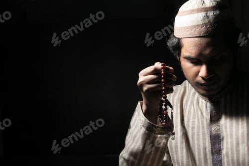 Preview: muslim man praying during ramadan, Close up