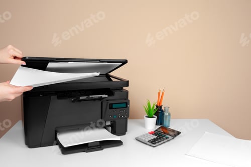Preview: Woman using the printer to scanning and printing document