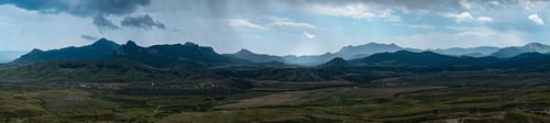 Preview: Incredibly beautiful landscape view from the mountain to the valley before a thunderstorm in spring.