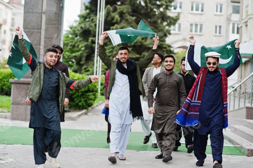 Preview: Group of pakistani man wearing traditional clothes salwar kameez or kurta with Pakistan flags.