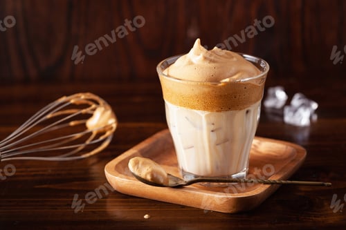 Preview: dalgona coffee in glass. trendy Instant coffee whipped with sugar and hot water