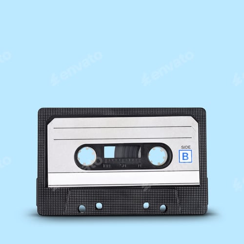 Preview: Old audio tape cassette on blue background