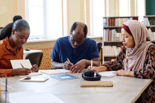 Preview: Group of Immigrants Making Notes