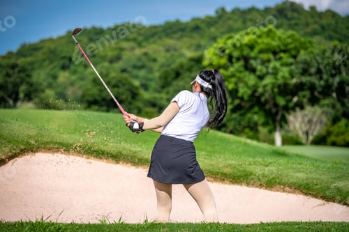 Preview: Professional woman golfer teeing to hole in player tournament competition at golf course for winner