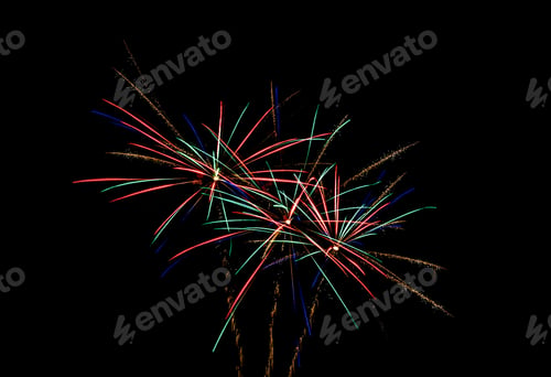 Preview: Long exposure shot of vibrant fireworks in the night sky for the 4th of July