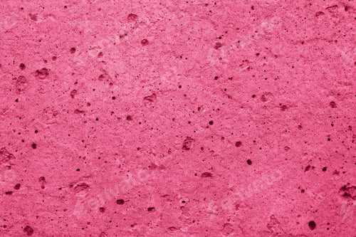 Preview: Wall of concrete with pores in trend color of the 2023 viva magenta.