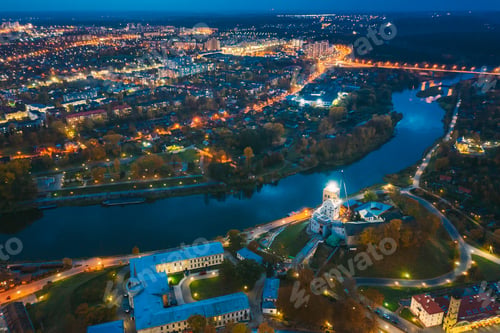 Preview: Grodno, Belarus. Night Aerial View Of Hrodna Cityscape Skyline. Popular Famous Historic Landmarks In