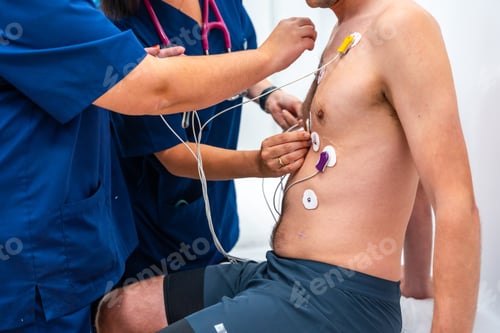 Preview: Cardiologists placing electrodes to a patient performing a stress test