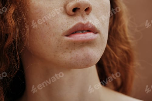 Preview: Young female face with freckles