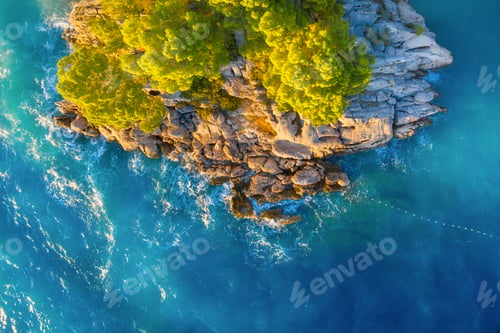 Preview: View from the air on the waves and rocks. Sea relaxation and travel.