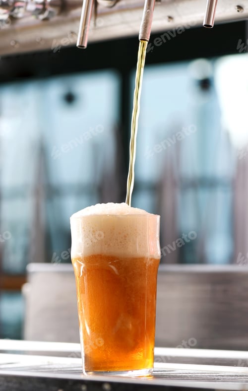 Preview: Drafting a glass of beer from a tap in a pub