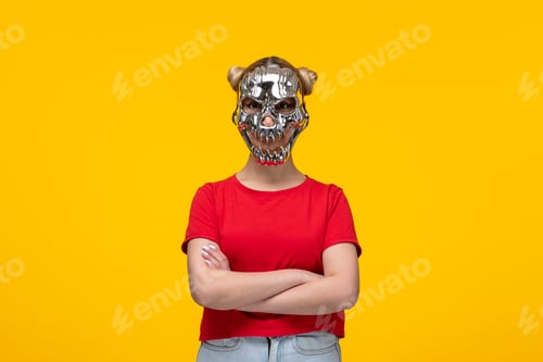 Preview: beautiful young female with scary golden mask yellow background girl cartoons