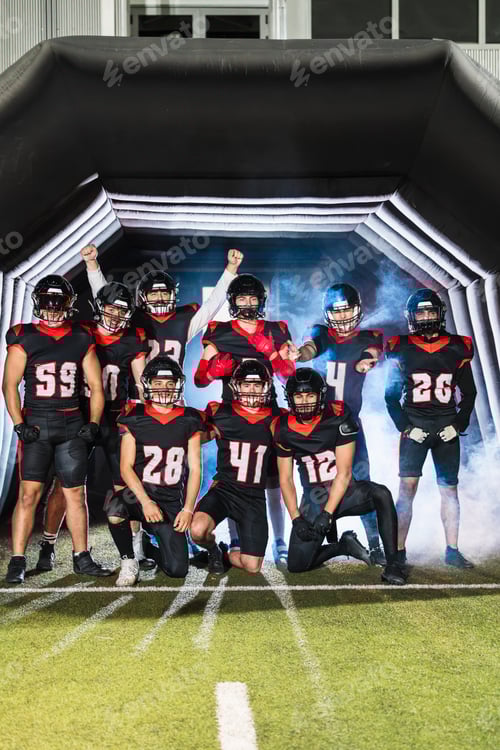 Preview: American football team emerging from tunnel with smoke