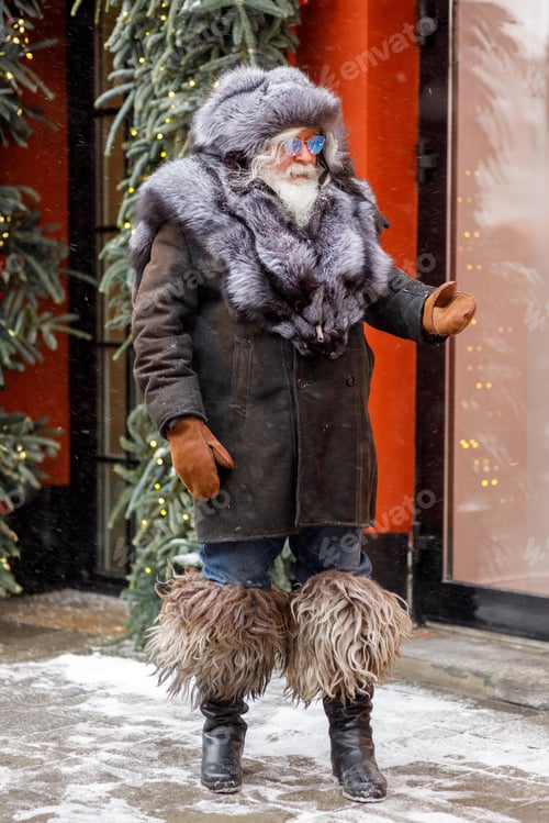 Preview: An elderly gray-haired man.A stylish hipster man wearing a fur hat and fur coat. Christmas