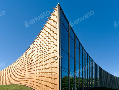 Preview: Modern university buildings, wooden beams projecting from a curved wood cladding