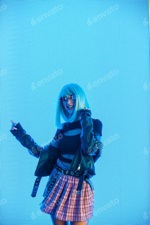 Preview: Beautiful woman illuminated by led lights