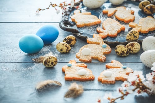 Preview: Homemade almond bunny cookies for Easter with Easter eggs in blue tone
