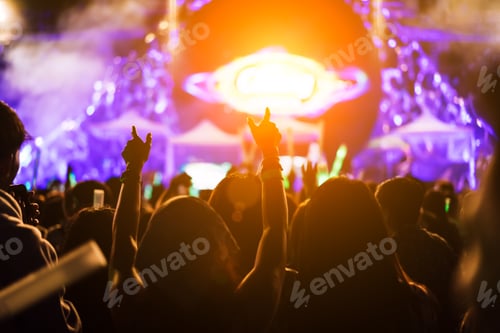 Preview: Excited Crowd Enjoys Outdoor Concert with Lighting