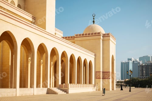 Preview: Golden sunlight graces the elegant architecture of a mosque