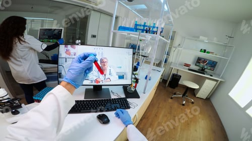 Preview: POV of scientist advicing with professional doctor on video call