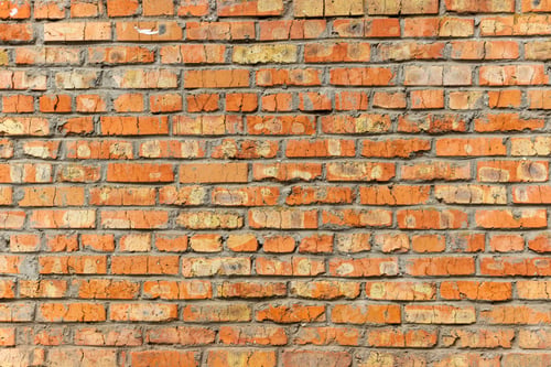 Preview: Background of old vintage dirty brick wall with peeling plaster, texture