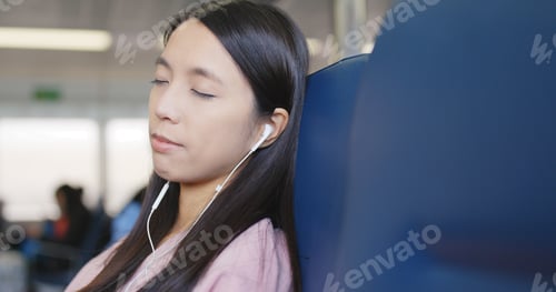 Preview: Woman sleeping on ferry and listen to music