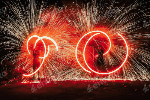 Preview: Fire dancers swing, spinning red fire and man juggling with bright sparks