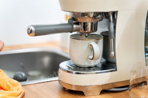 Preview: Espresso machine brewing fresh coffee into mug