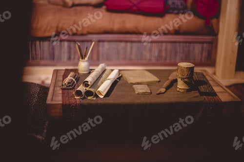 Preview: Amazing view of a wooden table with old manuscripts on it