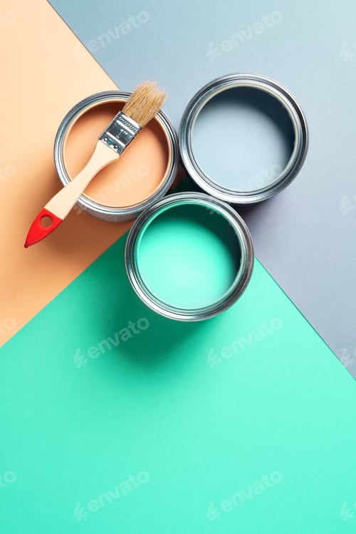 Preview: Metal paint cans and paint brushes on multicolor background. Top view. Copy space. Trendy green
