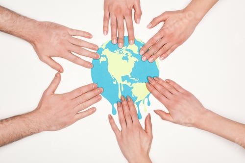 Preview: partial view of women and men putting hands on paper cut melting globe on white background, global