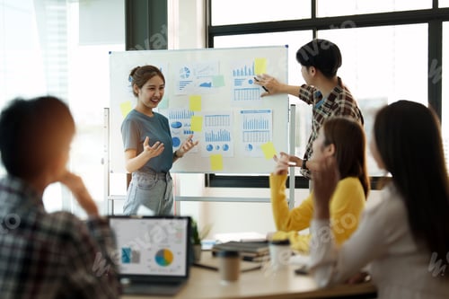 Preview: group of young creative asian people doing brainstorming meeting colleagues in board room discussing