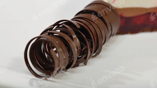 Preview: Sweet tubes - dessert. Chocolate tube for decoration, closeup.