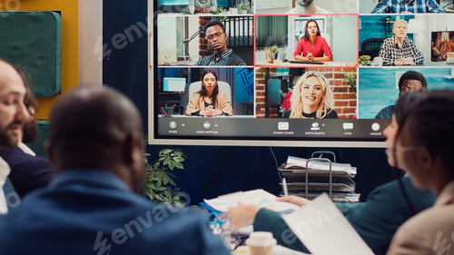 Preview: Business associates meeting with stakeholders on a videocall connection,