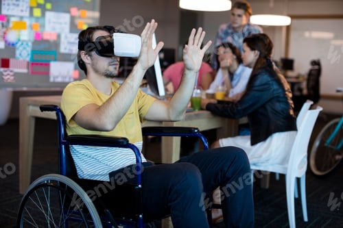 Preview: Physically disabled man on wheelchair using VR headset