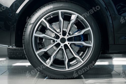 Preview: Aluminium rim of luxury car wheel close up